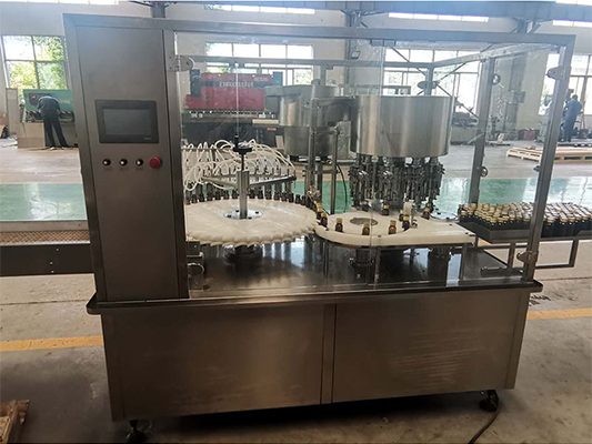 口服液灌轧机.jpg 口服液灌轧机.jpg